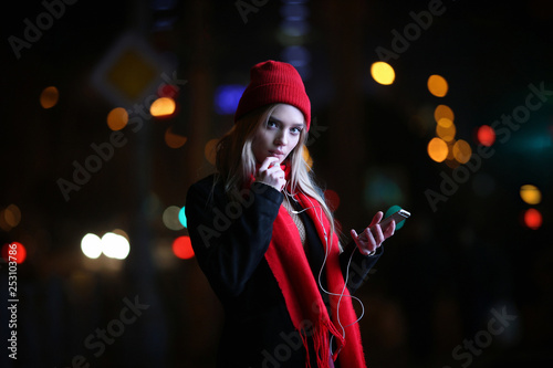 Beautiful young girl with smartphone