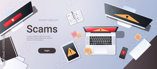 scam alert internet fraud hacking scams concept top angle view desktop computer monitor laptop tablet smartphone screen malware notification or error horizontal copy space