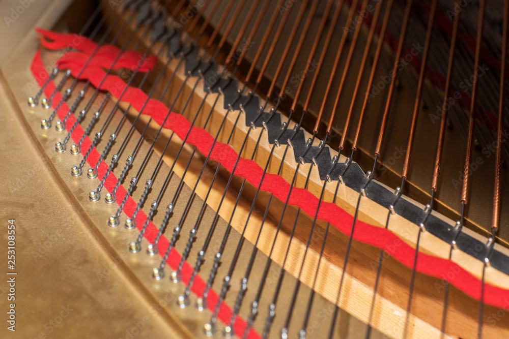 Grand piano strings, steel wire core wound with copper wire Grand piano strings, steel wire core wound with copper wire