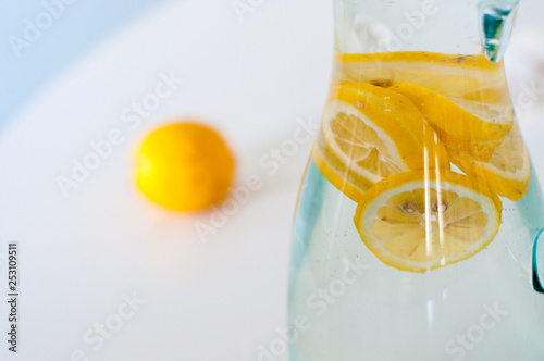 Good morning! Fresh yellow lemon slices in the water brings positive energy and optimism with vitamin C