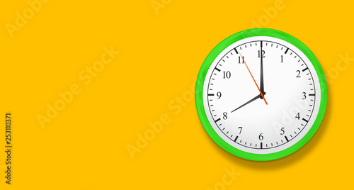 Wall Clock - Green Clock on Yellow Wall