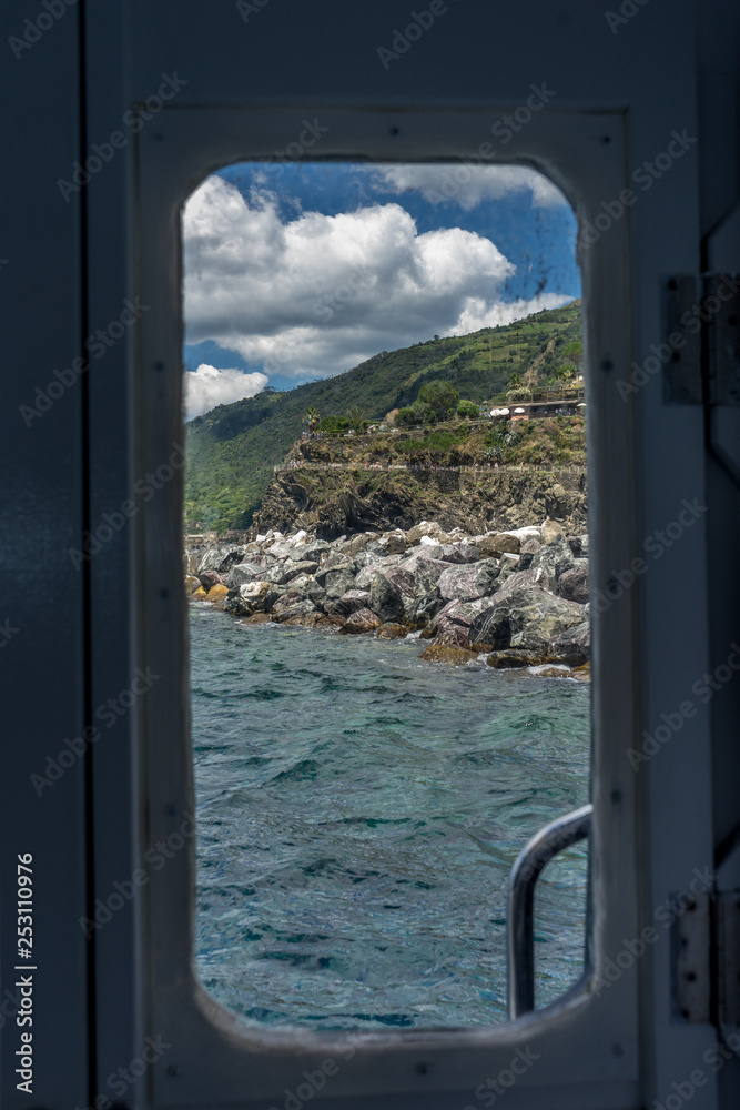 Italy, Cinque Terre, Monterosso, a view of a car door window