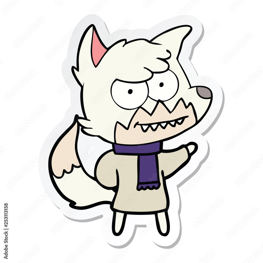 sticker of a cartoon grinning fox in winter clothes