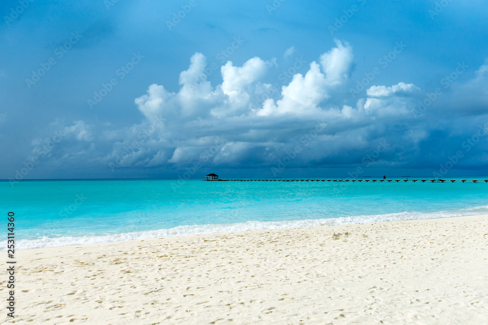  Maldives island with white sandy beach and sea