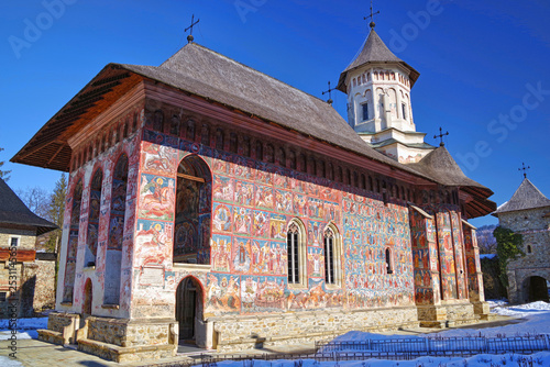 Exterior frescoes on Moldovita church walls photo