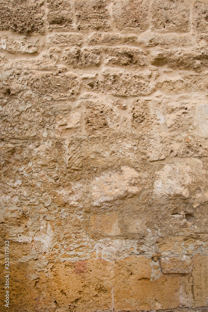Old stone wall made of sandstone Old stone wall made of sandstone