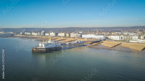 Aerial view over Eastbourne Pier at the south coast of England © 4kclips