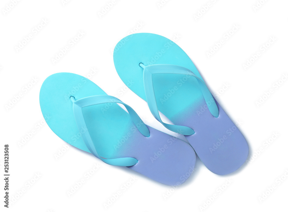Bright flip flops on white background, top view. Beach accessories Bright flip flops on white background, top view. Beach accessories