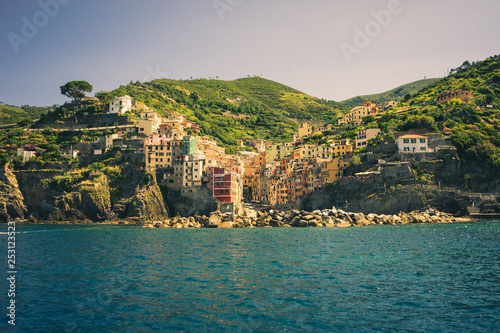 The cityscape of Riomaggiore viewed from the sea, Cinque Terre, Italy, Riviera