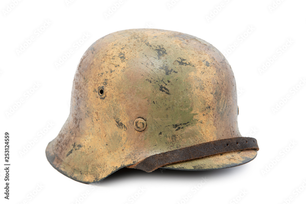 Fototapeta premium German World War Two (Stahlhelm M1942) military helmet, Normandy 1944