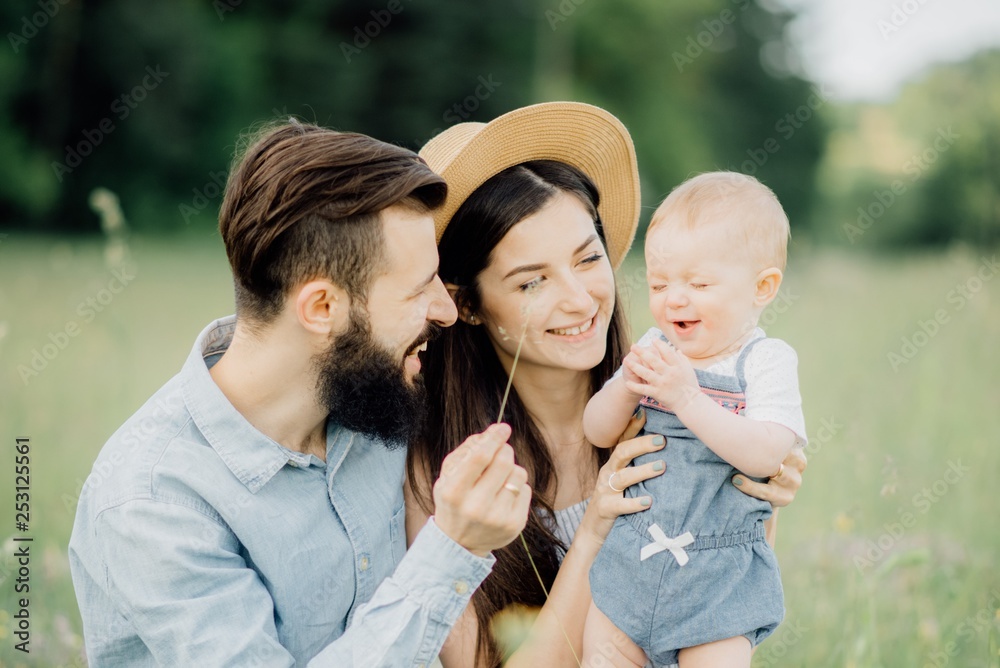 Fototapeta premium happy family on a spring picnic