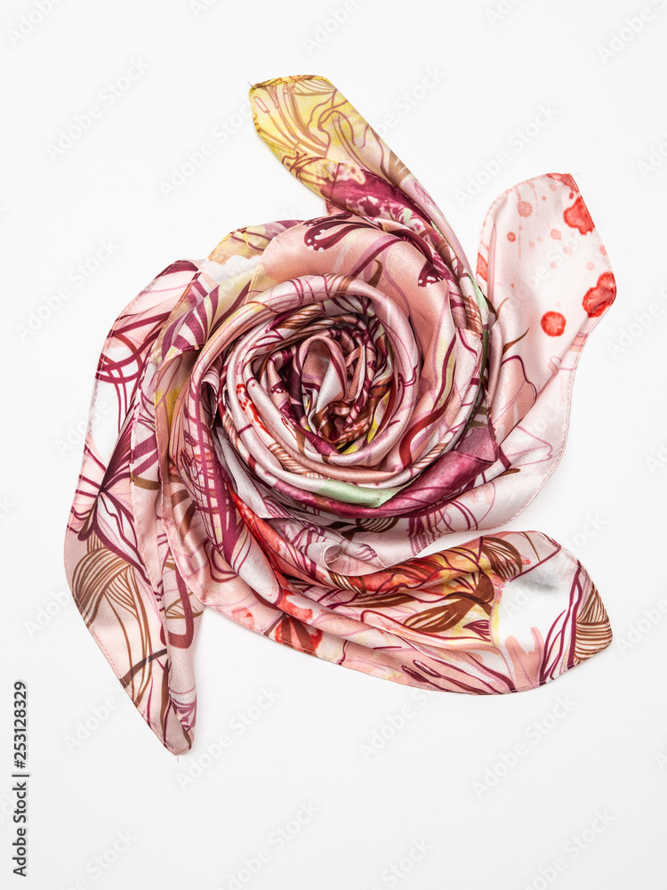 Multicolor silk scarf on white background. Top view.