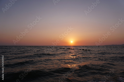 Orange sky and sunset over the sea.. © Konkapp