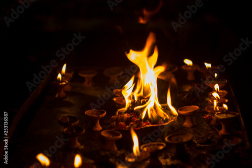 sacred flame on the altar in the dark time of Diwali festival