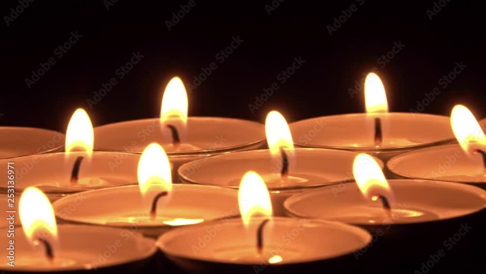 Candle flame at night. Black background Candle flame at night. Black background