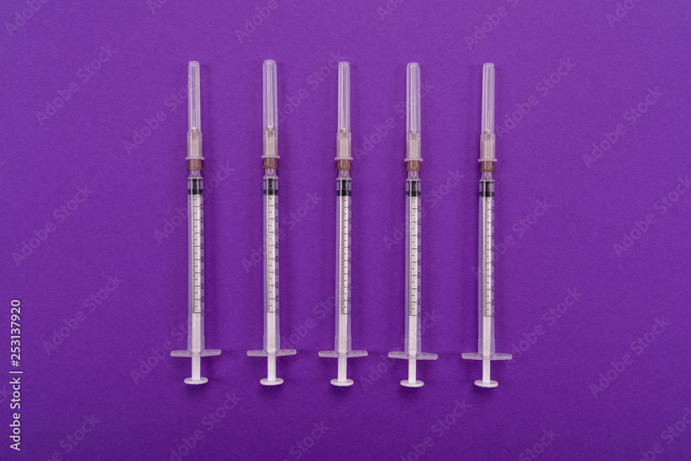 1-ml syringes isolated on a bright background 1-ml syringes isolated on a bright background