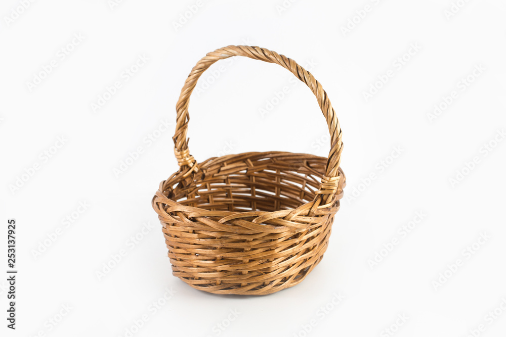 empty wicker basket isolated on white background