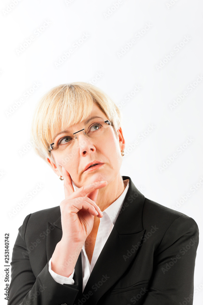 Thoughtful mature businesswoman Thoughtful mature businesswoman