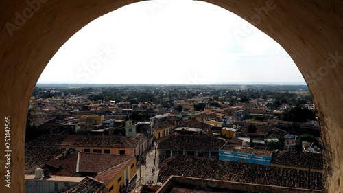 View through the arc of the clocktower in the city of Trinidad, Cuba.