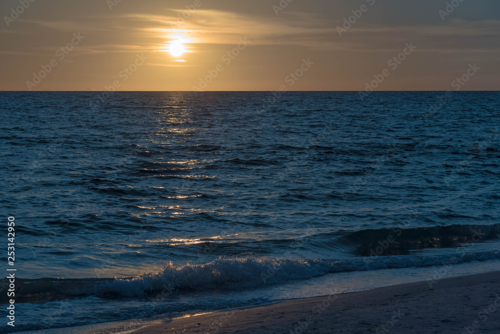 Golden globe at sunset on Treasure Island, Florida