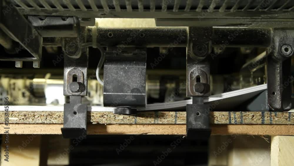 Paper Sheets Are Loading In Offset Printing Press Machine. Print industry Paper Sheets Are Loading In Offset Printing Press Machine. Print industry