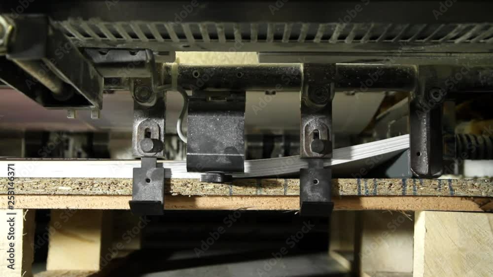 Paper Sheets Are Loading In Offset Printing Press Machine. Print industry Paper Sheets Are Loading In Offset Printing Press Machine. Print industry