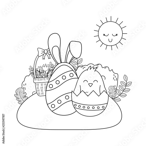 beautitul egg painted with ears rabbit and chick in the garden photo