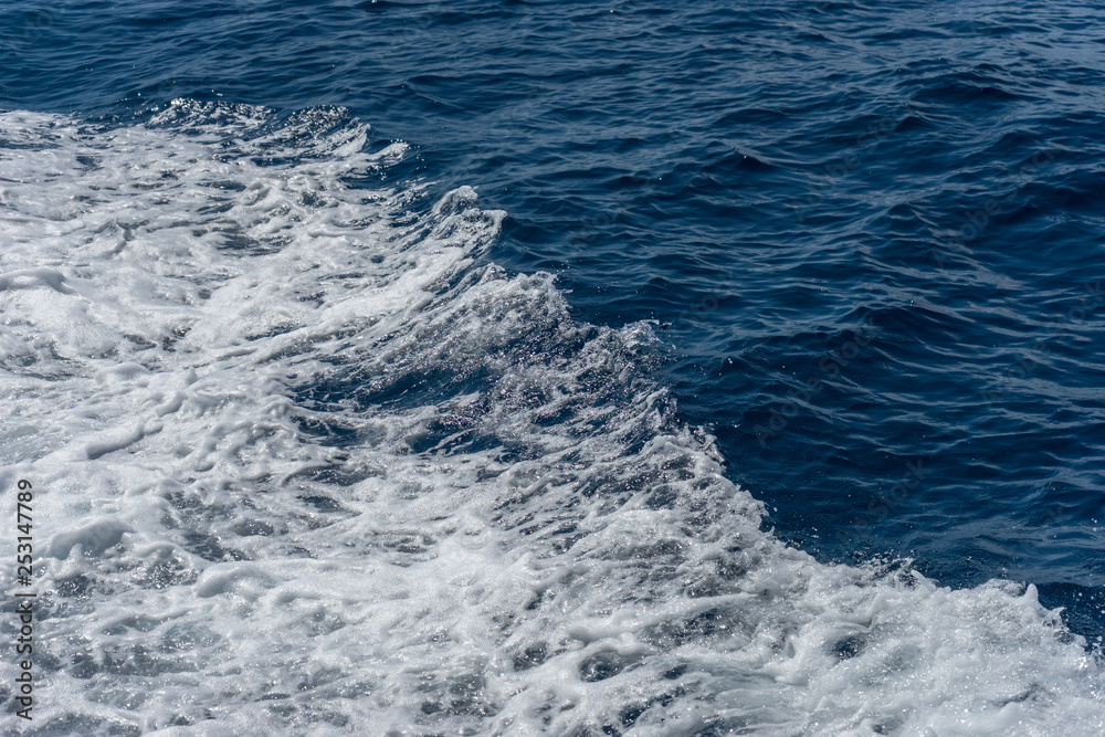 Italy,Cinque Terre,Riomaggiore,white frothing waves in the ocean Italy,Cinque Terre,Riomaggiore,white frothing waves in the ocean