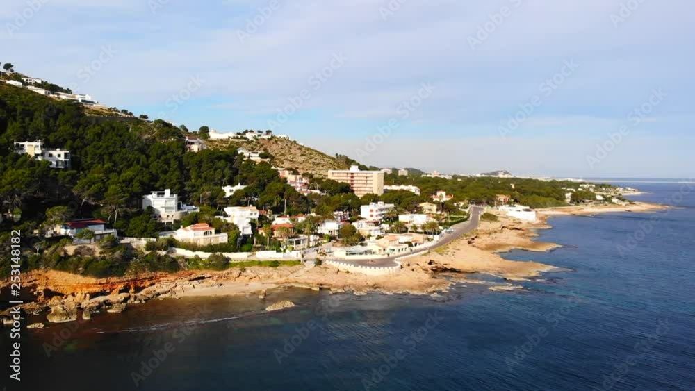 Aerial view of Las Rotas rocky beach in Denia, Spain at sunrise Aerial view of Las Rotas rocky beach in Denia, Spain at sunrise