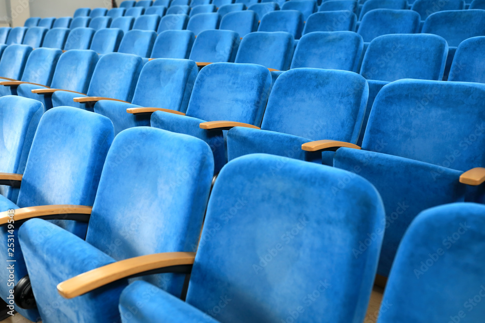 Fototapeta premium Row of blue seats
