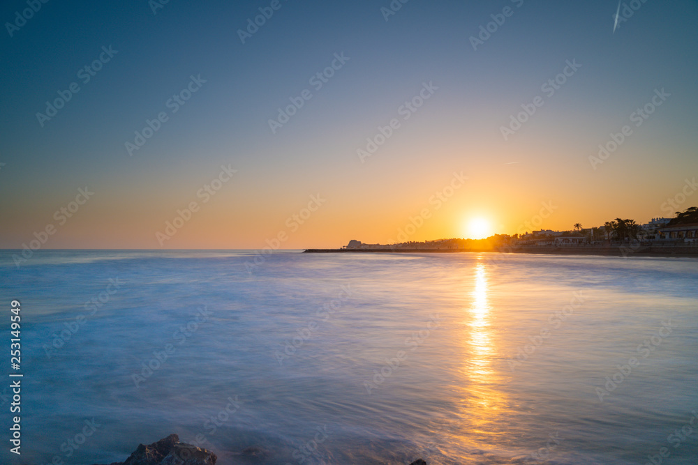 Sunset over the mediterranean sea on thegolden hour. Sitges, Spain.