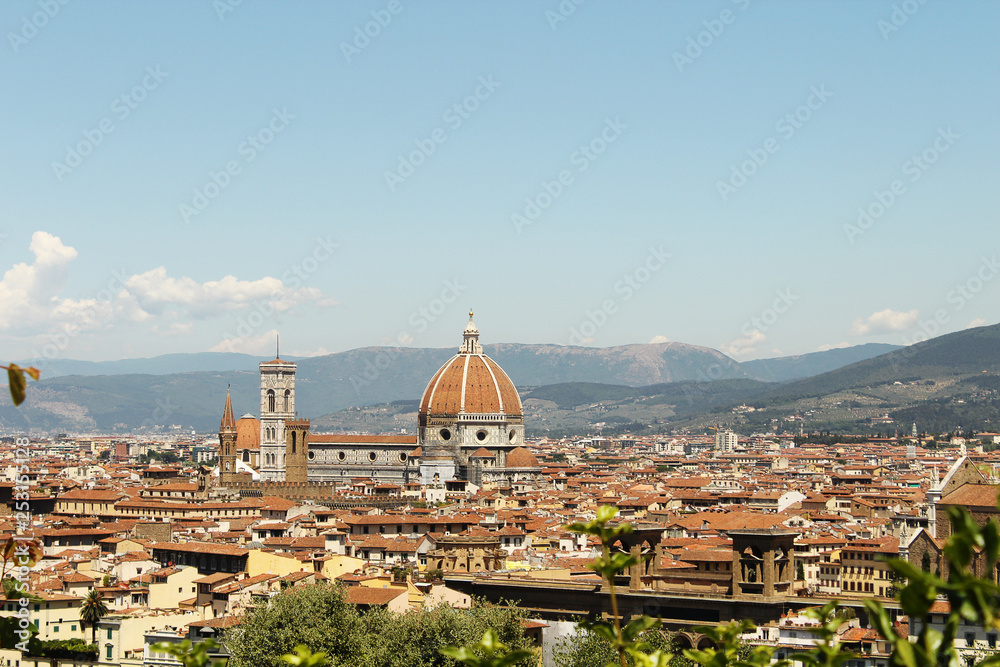 tiled roofs and cathedral of florence top view