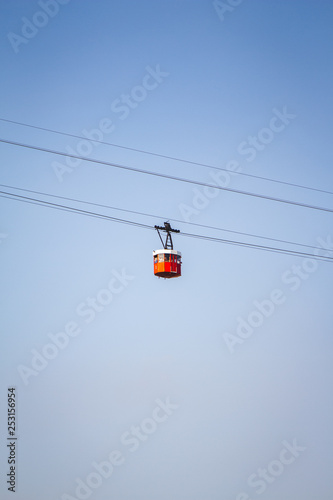 cable car on a background of blue sky