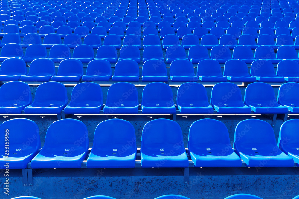 Fototapeta premium Rows of Blue Plastic Stadium Seats.