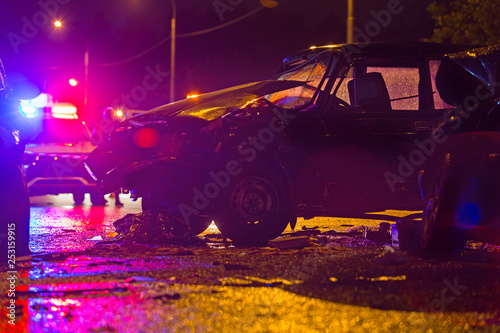 Night road car accident. Car crash in police lights