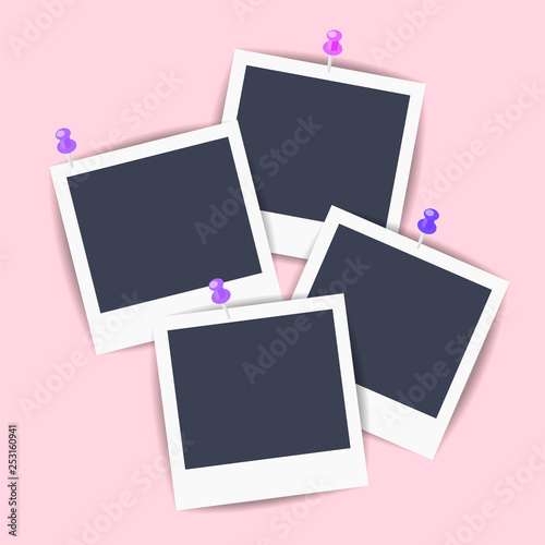 Empty Polaroid pictures pinned to the wall