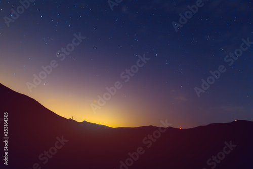 Starry sky in the mountains. Night in nature. Sky