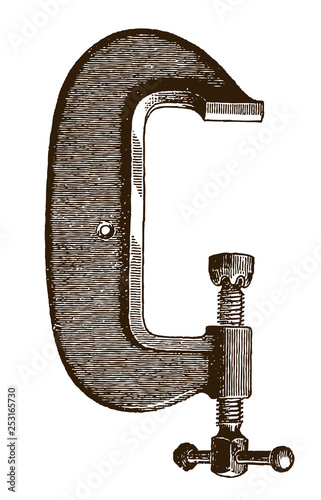 Antique heavy steel clamp in side view after etching or engraving from 19th century