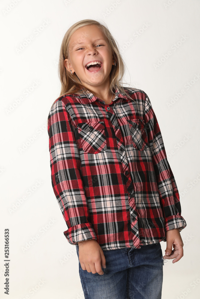 Portrait of a girl with long blond hair who laughs. White background Portrait of a girl with long blond hair who laughs. White background