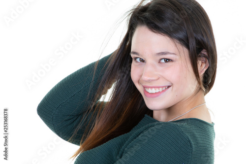Studio portrait of an excited young woman