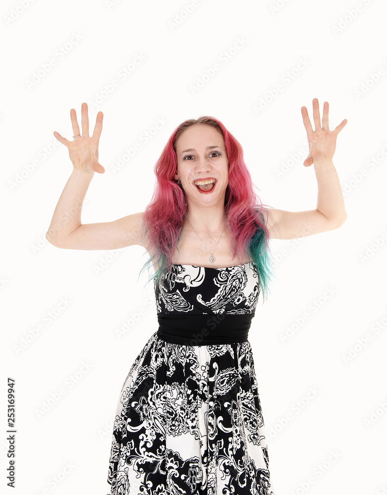 Happy woman lifting hands up screaming for fun Happy woman lifting hands up screaming for fun