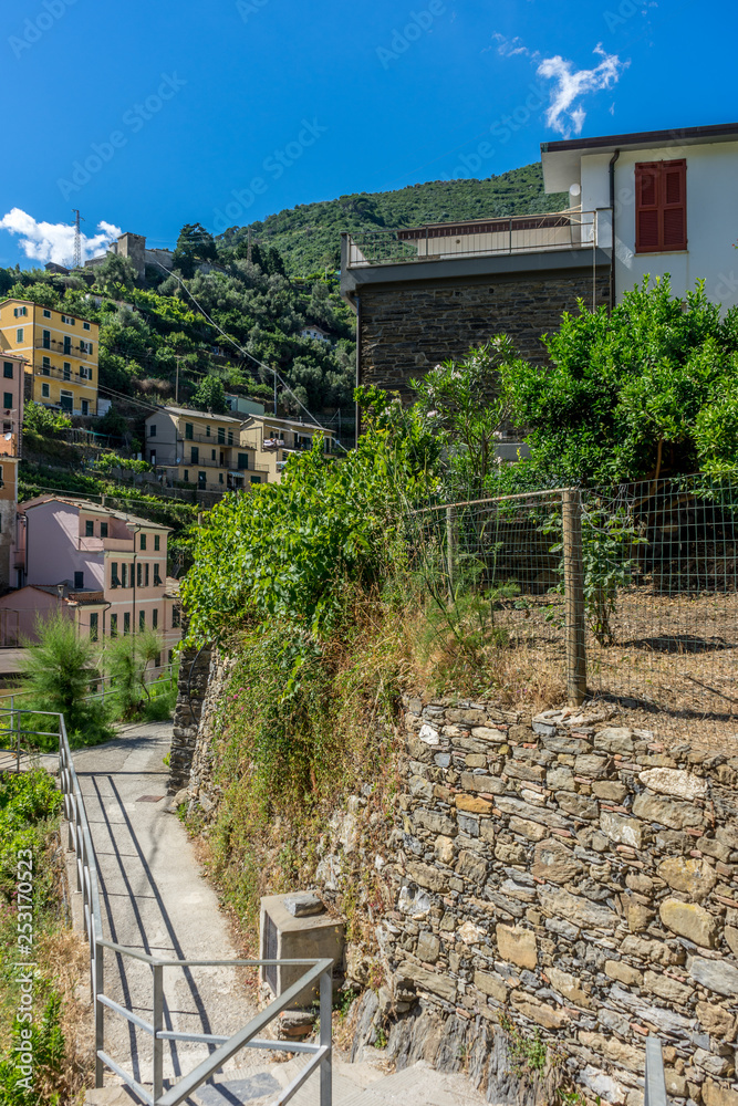 Italy, Cinque Terre, Vernazza, a house with a fence in a garden