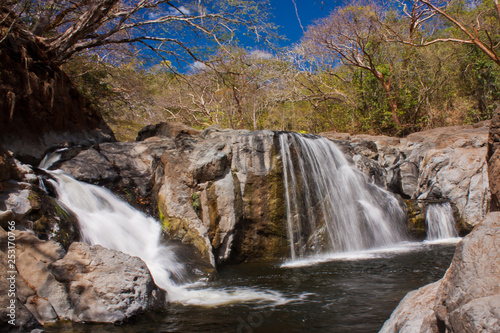 Waterfall in exotic Costa Rica near Samara beach on east coast photo