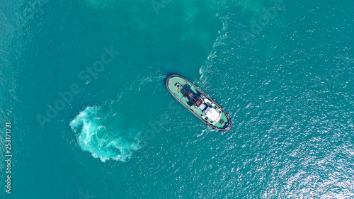 Aerial drone photo of tow boat cruising in mediterranean port © aerial-drone