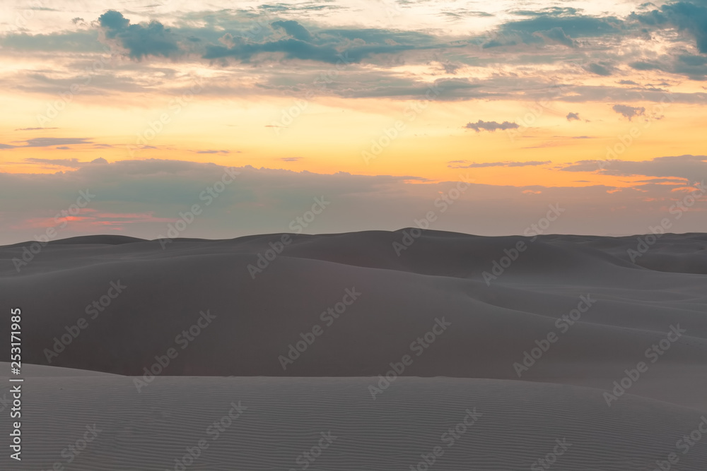 Untouched sand dunes at sunset - calmness and tranquility