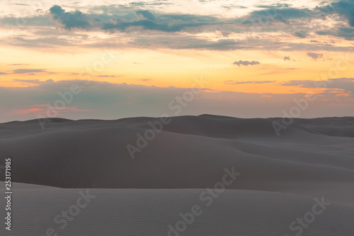 Untouched sand dunes at sunset - calmness and tranquility