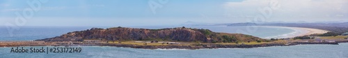 Panoramic view of Gallows Beach and Corambirra Point viewed from Muttonbird Island. Coffs Harbour, New South Wales, Australia photo