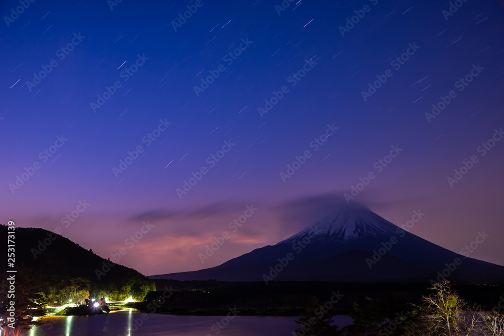 Mount Fuji at twilight after sunset, the World Heritage, view at Lake Shoji ( Shojiko ). Fuji Five Lake region, Minamitsuru District, Yamanashi prefecture, Japan. Landscape for travel destination.