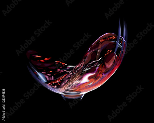Splash of red wine in a glass
