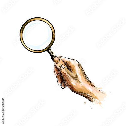 Hand holding magnifying glass